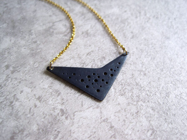 Oxidised silver geometric hole-patterned pendant on fine gold-filled chain - Image 2